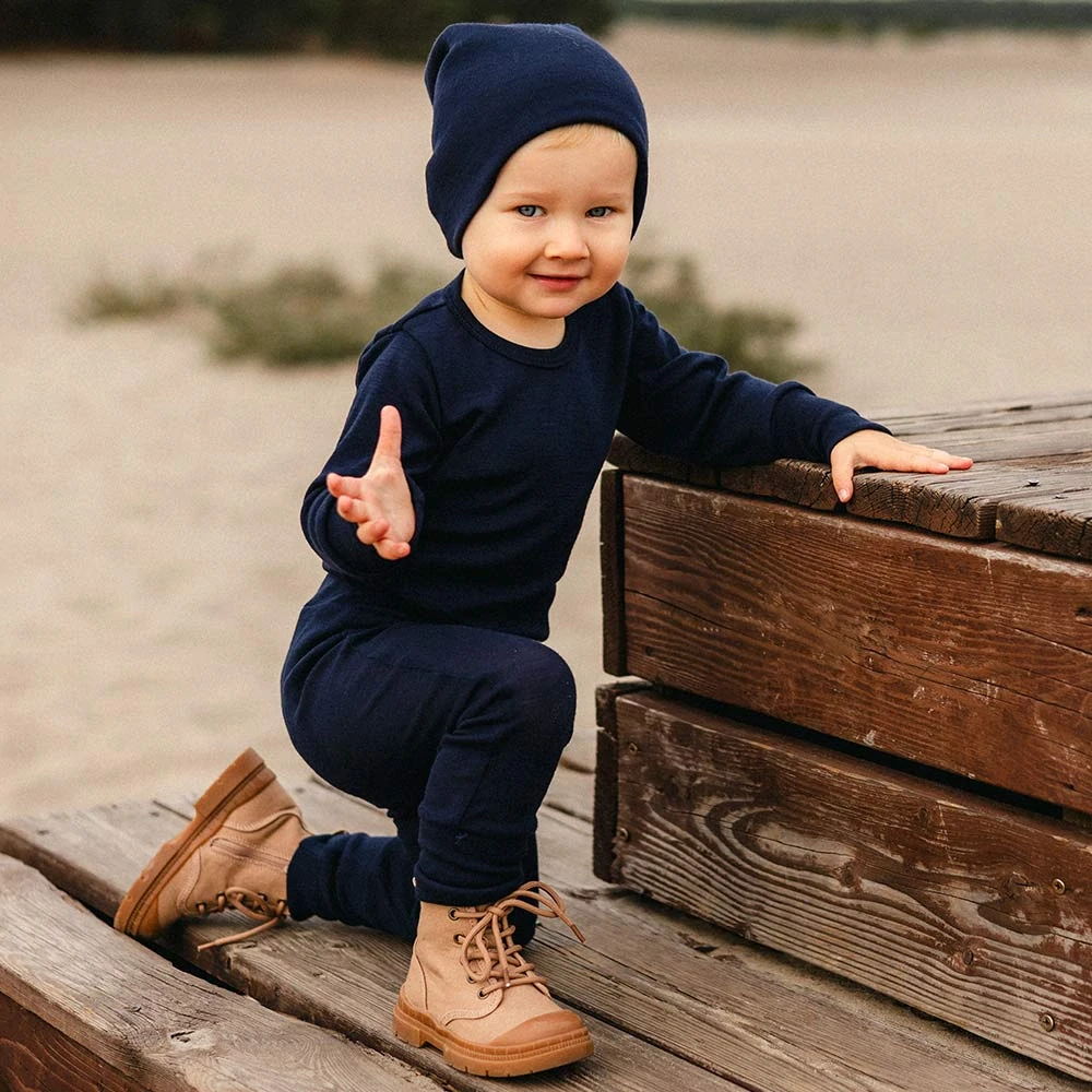 Eevi Body z merino vlny rostoucí tmavě modré